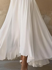 Fließendes weißes Maxikleid