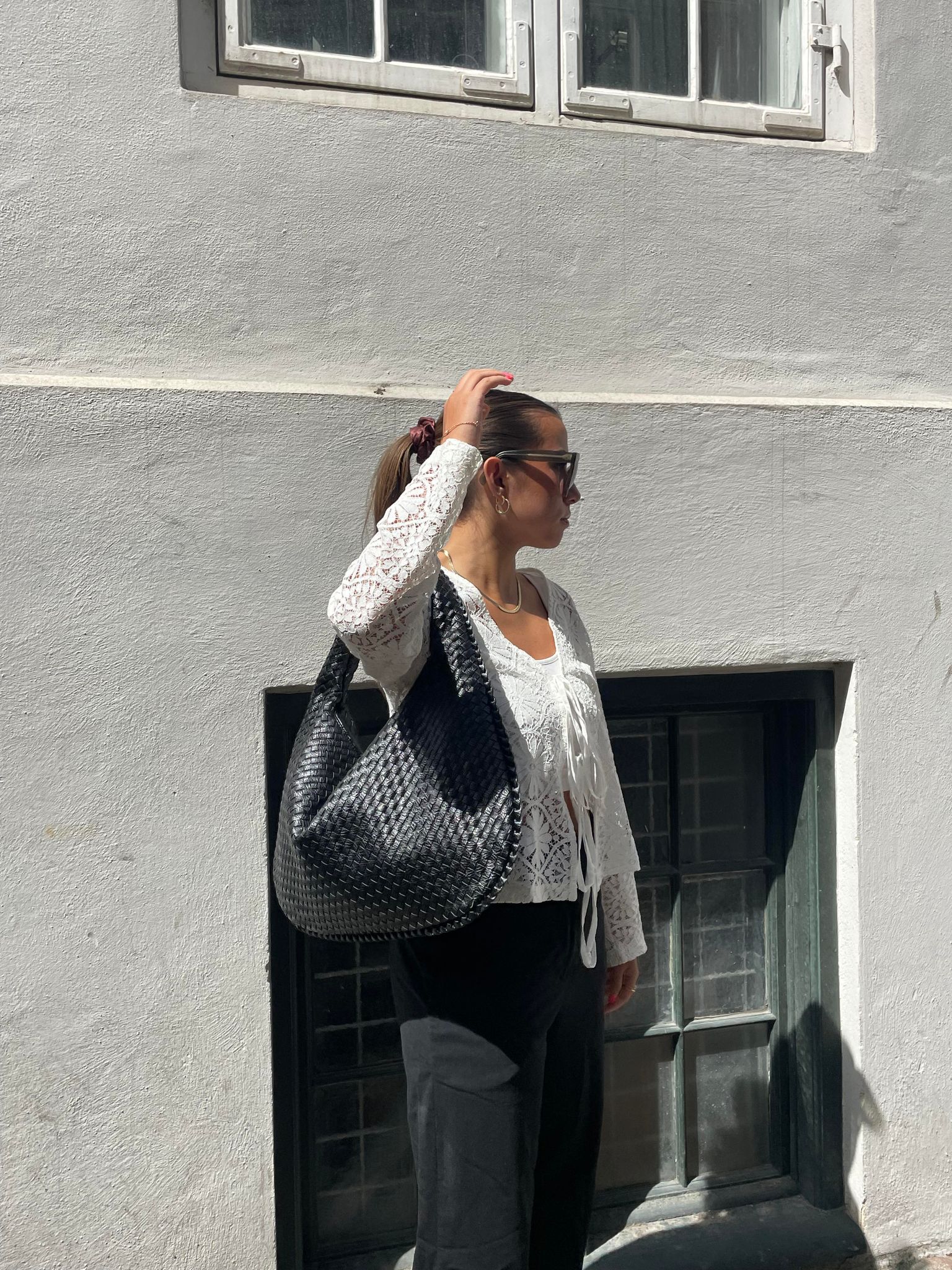 Trendige geflochtene Tasche