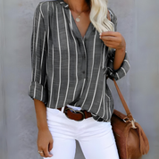 Moderne gestreifte Damenbluse mit Stil