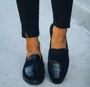 Schwarze Loafer mit Krokodilmuster